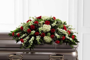The Sincerity Casket Spray from Clifford's where roses are our specialty